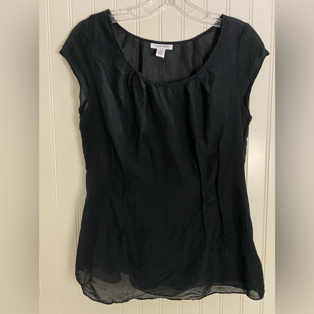 Calvin Klein silk-cotton top with a spaghetti strapped polyester lining